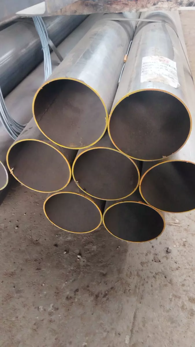 Stacked steel pipes close-up