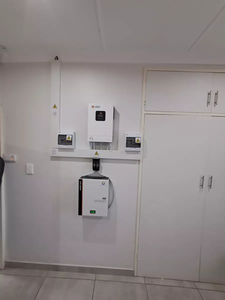 Solar inverter and battery system installed on a wall